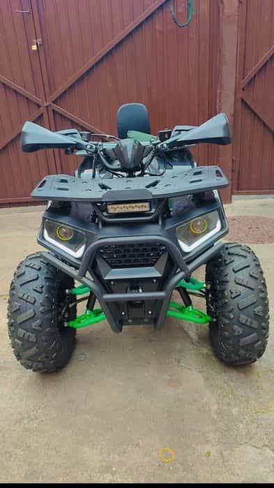 ATV 125 CC este nou are doar 400 de km  impecabil urgent doar cash