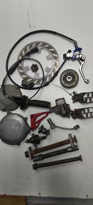 Kawasaki kx 125 ośka dekiel wałek Magneto tarcza rolgaz chłodnica