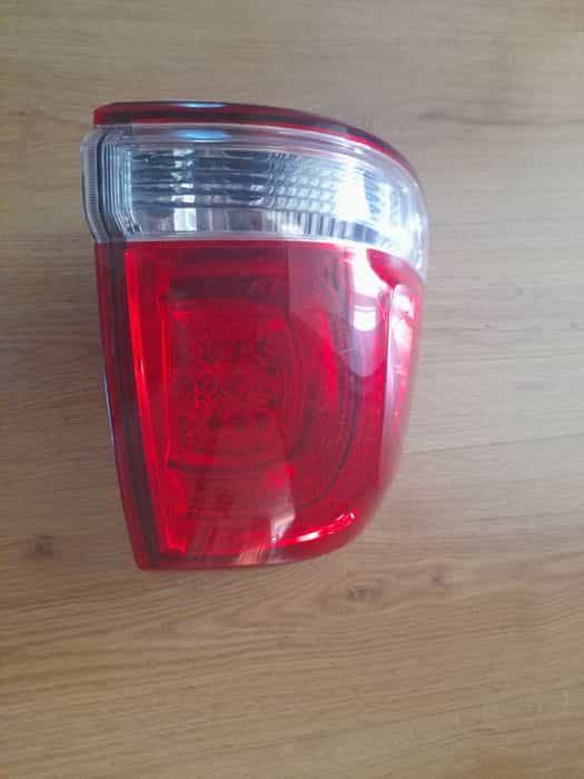 Lampa tylna lewa Toyota Land Cruiser.