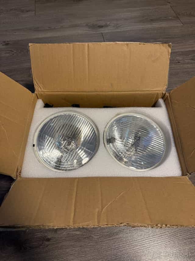 Svetlomety Hella H4 Jeep Wrangler LR Defender