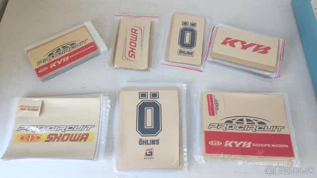 Polepy na trubice tlmičov.