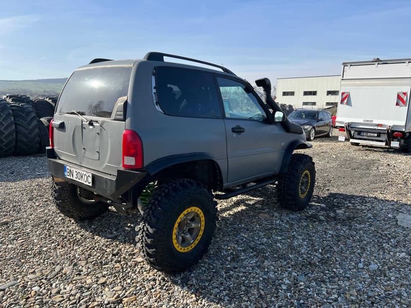 Suzuki Grand Vitara 2.7 benzina/ modificata off-road , punti de Patrol