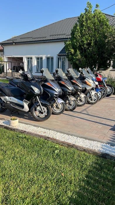 Motociclete, scutere și piese de schimb