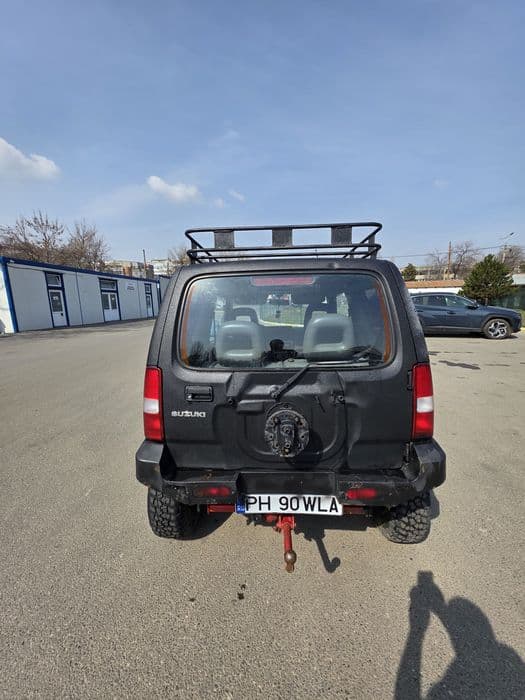 Suzuki jimny 1.3 cu AC an 2003