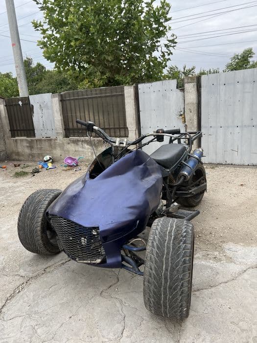 Vand sau schimb atv cu 3 rotii