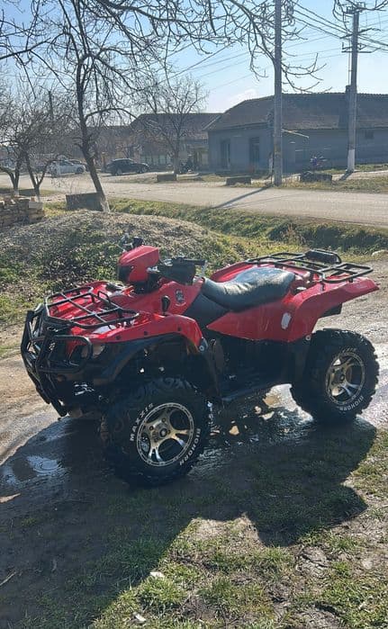 Vând Suzuki king quad