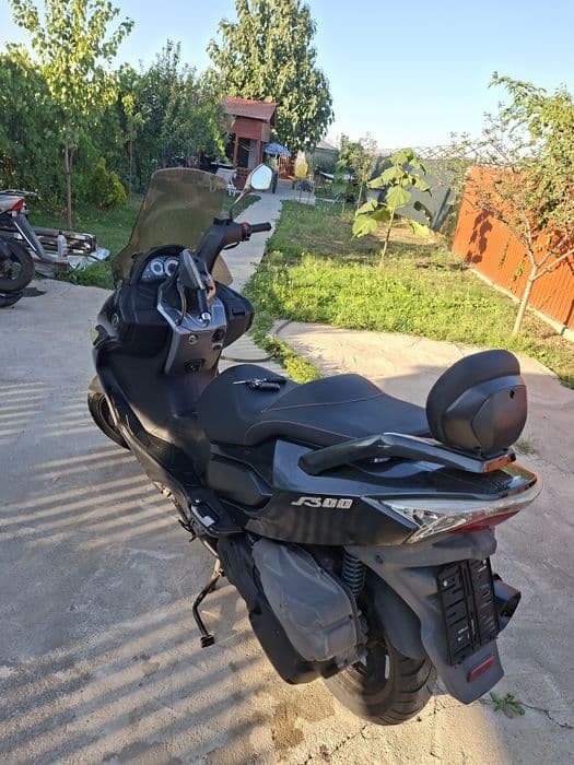 Scuter Daelim 300cc si yamaha xenter 125cc