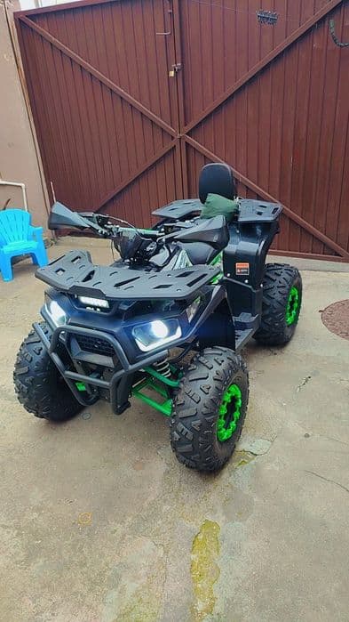 ATV 125 CC este nou are doar 400 de km  impecabil urgent doar cash