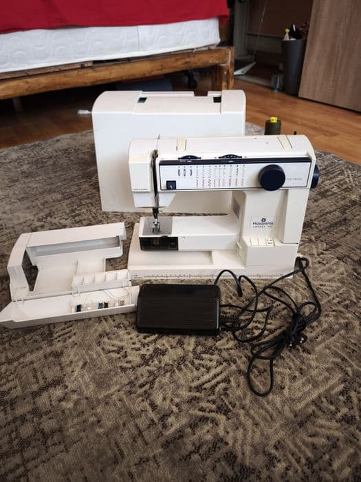 Mașina de cusut Husqvarna