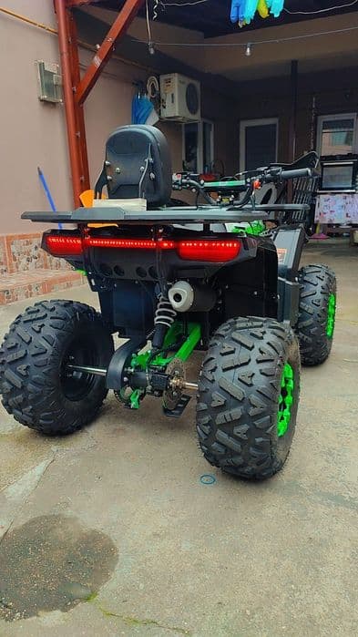 ATV 125 CC este nou are doar 400 de km  impecabil urgent doar cash