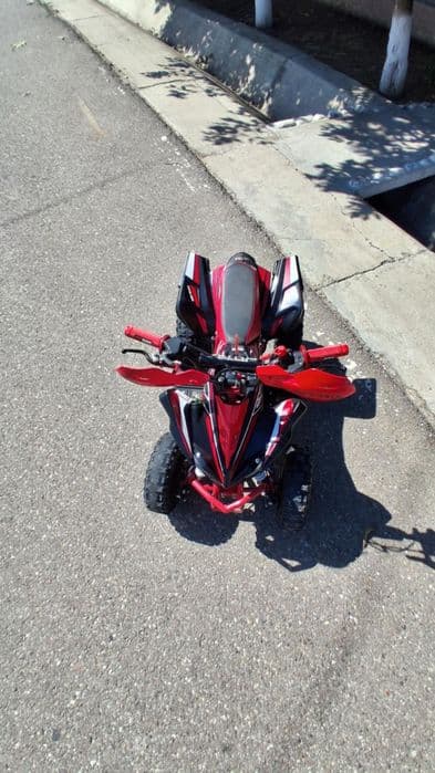 Vând atv 49cc pentru copiii!