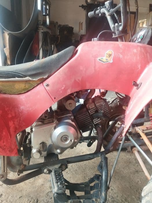 Vând sau schimb ATV kxd 110cc semi automat 1200 lei (schimb cu un alt