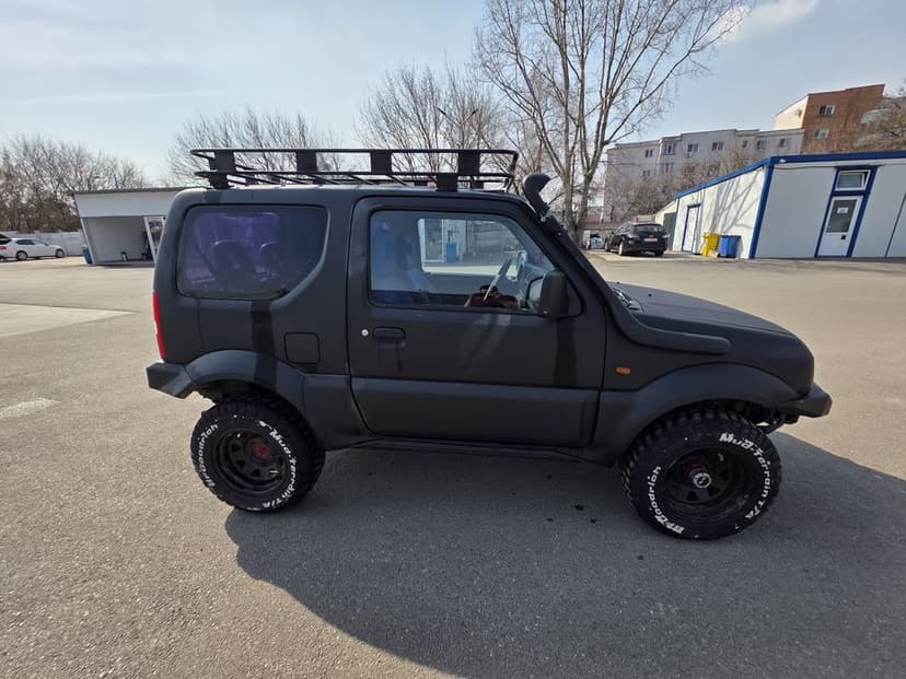 Suzuki jimny 1.3 cu AC an 2003