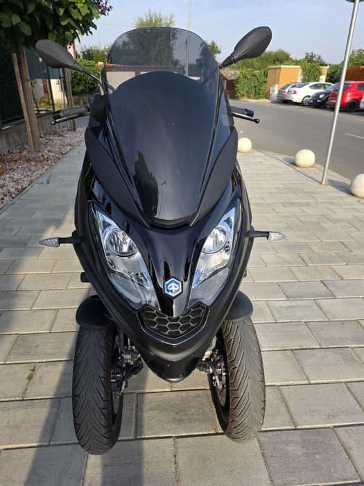 Scuter Piaggio MP3 se conduce cu categoria B ca nou impecabil