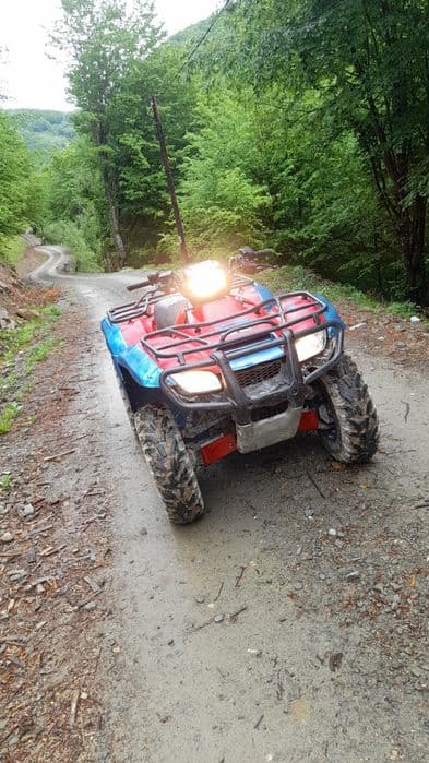 Vând atv honda . Sau schimb