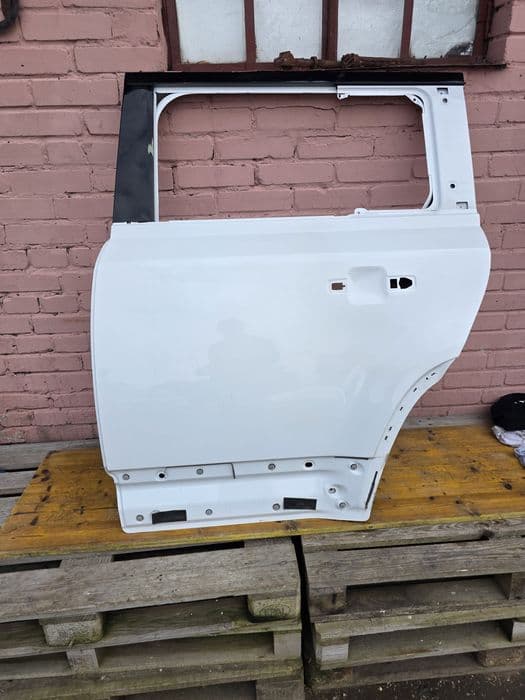 Drzwi lewy tył Land Rover Defender II 2 Oryginał ładne l8b2