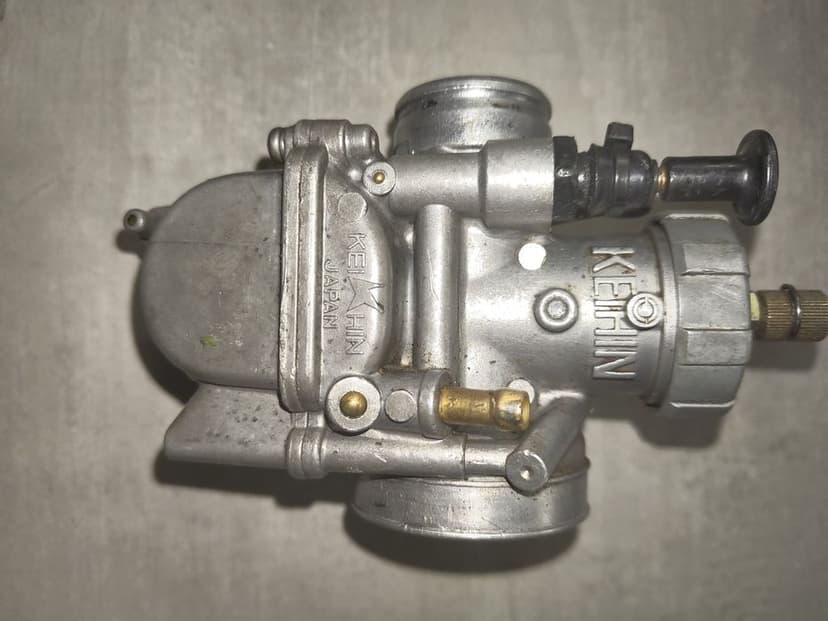 Kawasaki kx 80,85 skrzynia wałek  kartery gaźnik pompa zacisk ośka