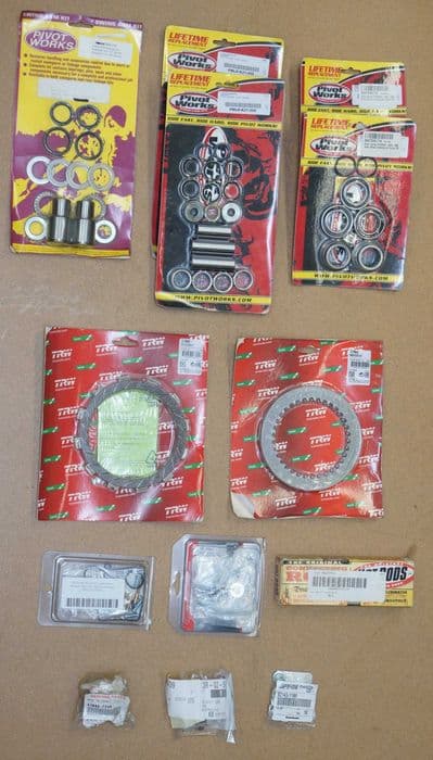 części do Kawasaki KX125 03–08 klocki tarcze łożyska zębatki itp. kxf