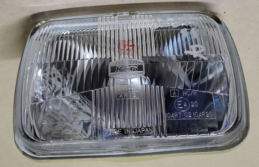 lampa przód reflektor h4 koito mazda jeep toyota hiace celica 4 runner nowa