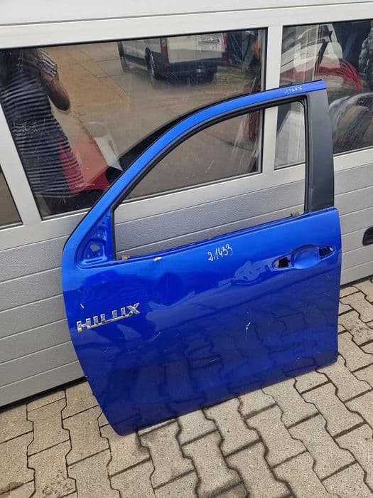 Toyota Hilux 15 r.- Drzwi Przód Lewe