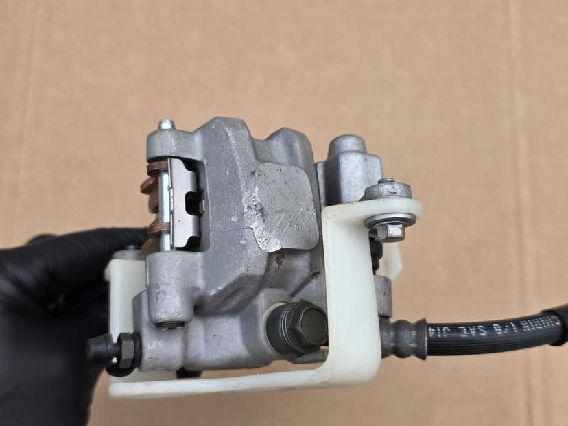Tył tylny zacisk hamulcowy Kawasaki KX KXF 250 / 450 OEM ! + przewód
