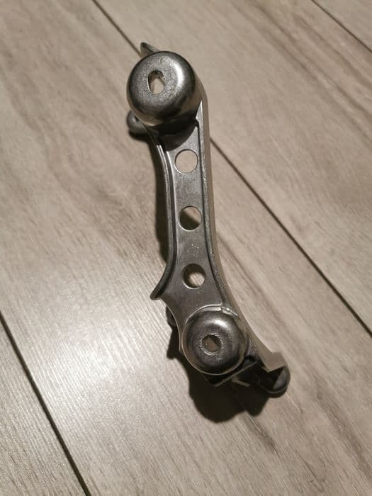 Yamaha raptor 350 uchwyt wspornik mocowanie błotnika przód lewy