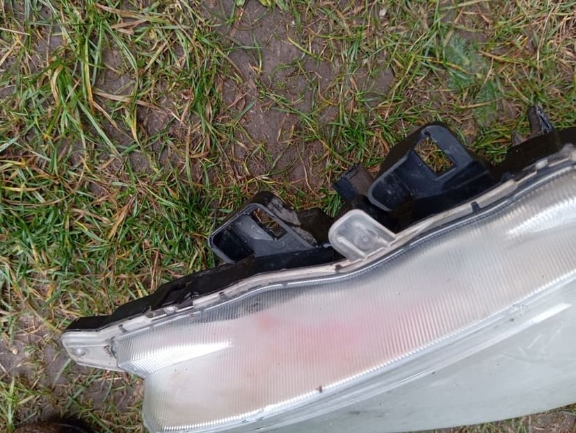 Lampa reflektor lewy przód Nissan Navara Oryginał Europa