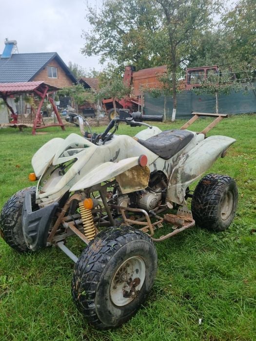 Vând atv defect motor 125