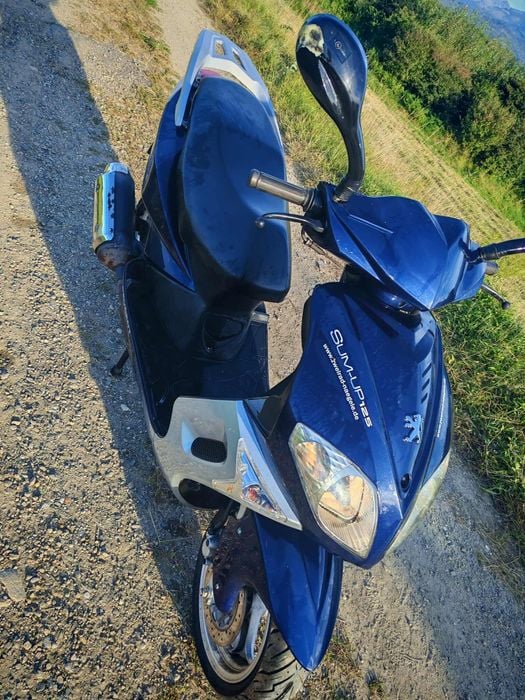 Vând scutter Peugeot 125 in 4 timpi din 2009 impecabil