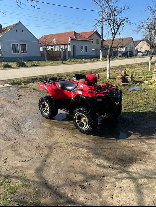 Vând Suzuki king quad