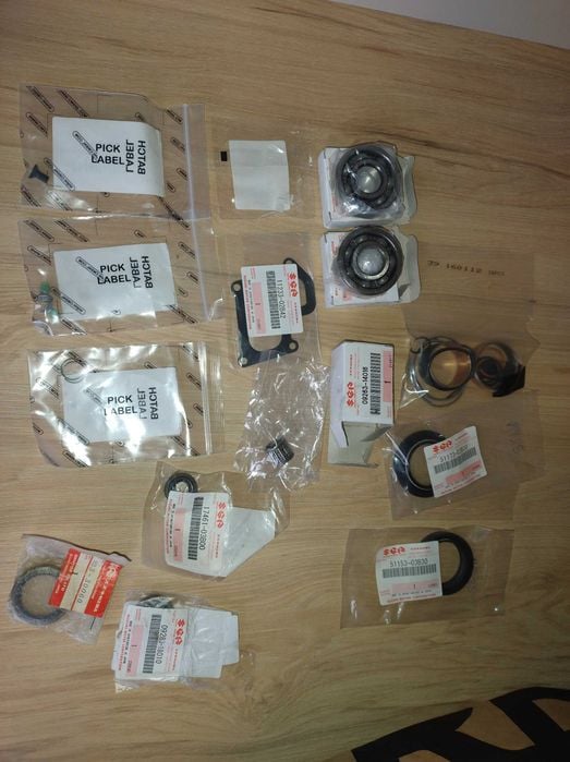 Suzuki RM 85 łożyska wału simeringi zabezpieczenie oem