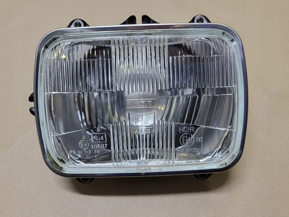 lampa przód reflektor h4 koito ramka chrom mazda jeep toyota hiace celica