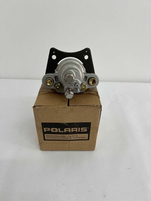 Polaris Sportsman 500 570 zacisk hamulcowy tylny nowy oryginał OEM tył