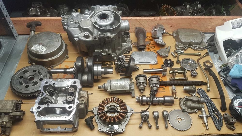 polaris 500 sportsman kartery glowica wal stator magneto slizg pompa