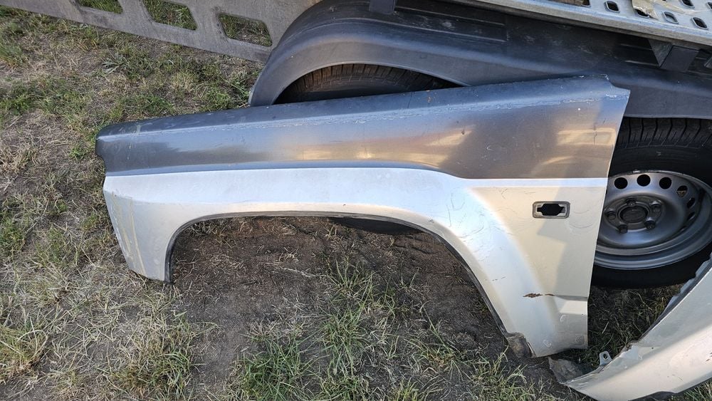 Nissan Patrol y60 blotnik lewy przod