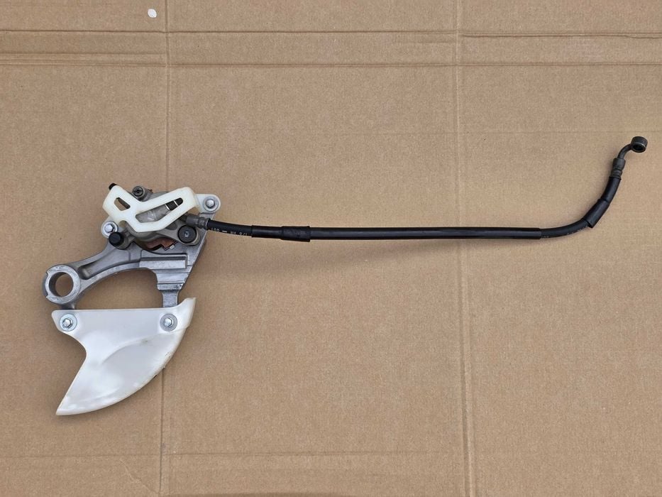Tył tylny zacisk hamulcowy Kawasaki KX KXF 250 / 450 OEM ! + przewód