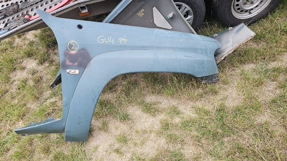 Nissan Patrol y61 GU4 błotnik prawy przód