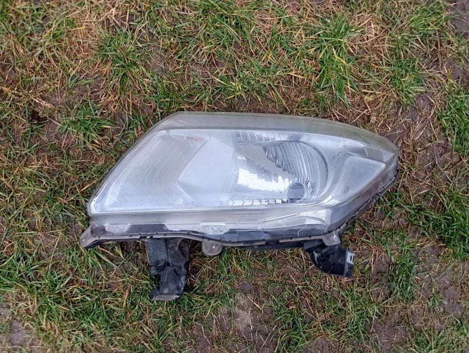 Lampa reflektor lewy przód Nissan Navara Oryginał Europa