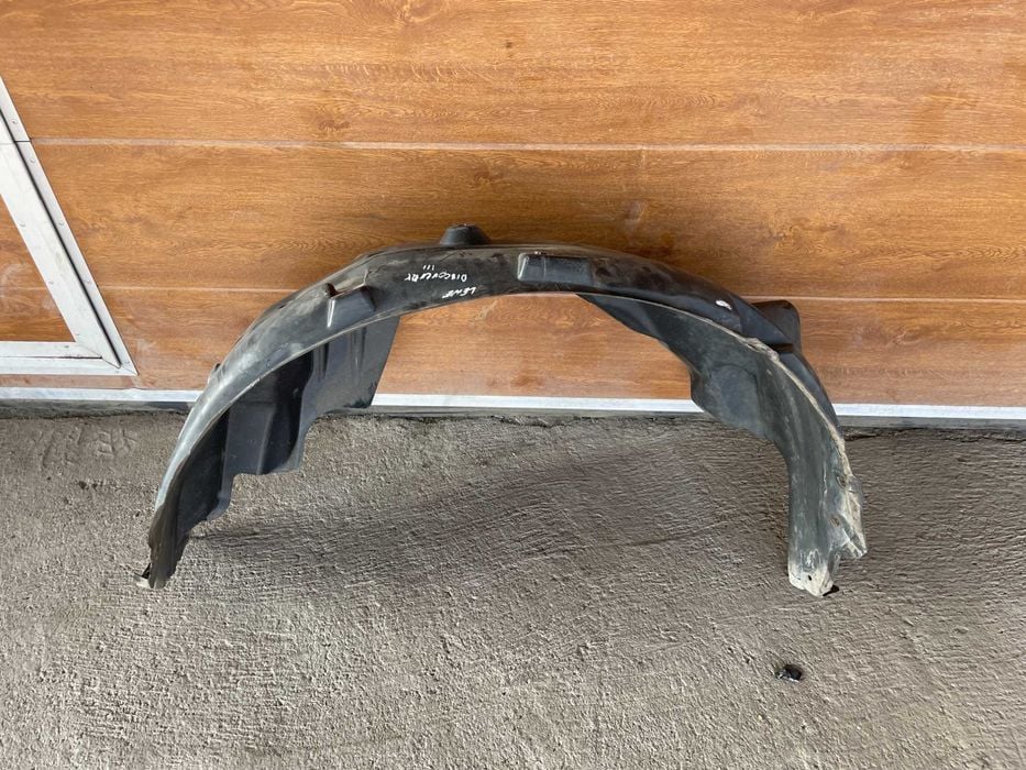 Nadkole Lewy Przód Land Rover Discovery III