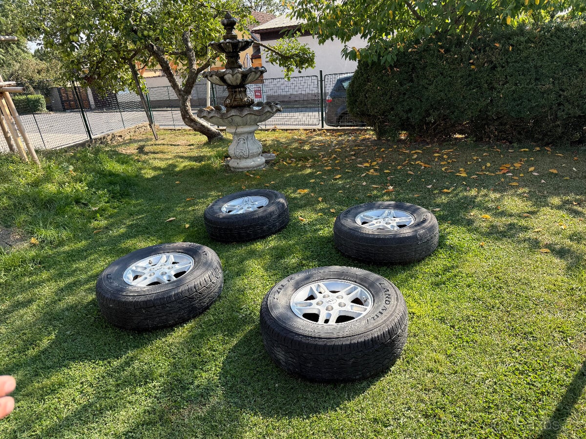 Prodám 16" alu kola s pneu Chryslet/Chevrolet